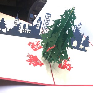 Joyeux Noël - Joyeuses Fêtes - Cartes de vœux pop-up 3D Pop Up:  Grand sapin et la ville  NOEL11