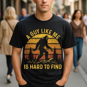 A Guy Like Me Is Hard to Find Cryptid Humor Design for Wilderness Fans, Outdoor Junkies, and Sasquatch Searchers T-Shirt
