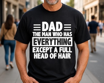 Camiseta del Día del Padre: Papá, el hombre que lo tiene todo menos una melena abundante.