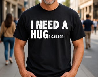 Camiseta con humor de mecánico para mecánicos con la frase "Necesito un garaje enorme"
