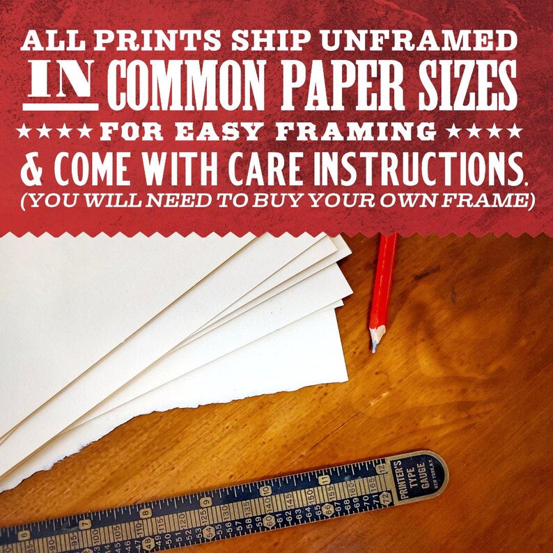 a wooden table with a stack of white paper sheets, a red pencil, and a ruler, along with text that reads "All prints ship unframed in common paper sizes for easy framing & come with care instructions. (You will need to buy your own frame)"