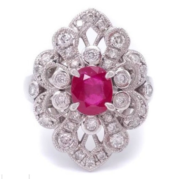 Antique platinum, pink ruby, and diamond ring