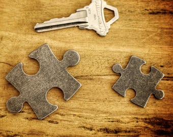 Talus - titanium EDC jigsaw puzzle piece by Titan Talon Tool Co.