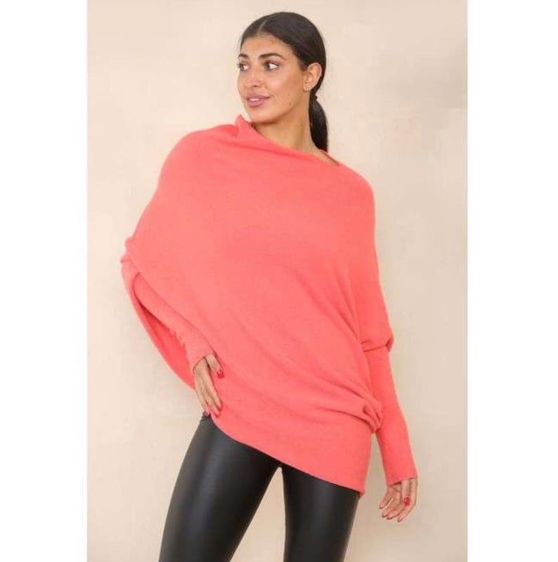 May include: A coral colored, long-sleeved, oversized sweater with a cowl neck.