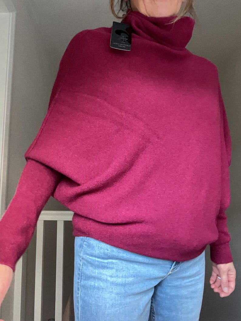 Roll Neck Draped Asymmetric Jumper by Alpini Knitwear Burgundy