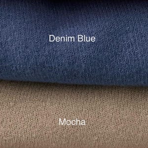 May include: Two fabric swatches, one denim blue and one mocha.