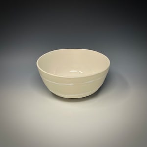 Handmade ceramic bowl, one-of-a-kind, wheel thrown earthenware. Glazed with food safe non-toxic glazes.