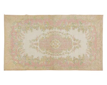 Vintage Turkish Wool Rug: Handwoven Isparta Carpet, Blush Pink Floral (3.8 x 7.1 ft.)