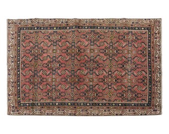 Vintage Handwoven Wool Area Rug: Middle Eastern Tribal Decor (3.9 x 6 ft.)