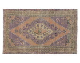 Vintage Turkish Rug: Faded Lavender & Peach, Niğde Medallion (3.8 x 7.1 ft)