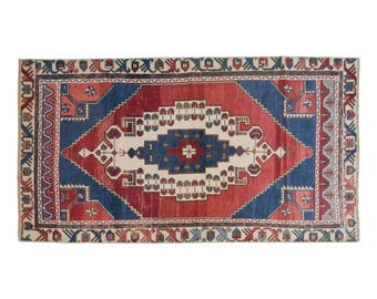Vintage Tribal Wool Rug: 4 x 7.9 ft Taşpınar Geometric Rug