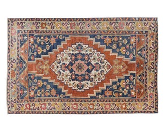 Vintage Turkish Rug: Tribal Medallion, Floral Taşpınar Design (4.4 x 7.3 ft.)