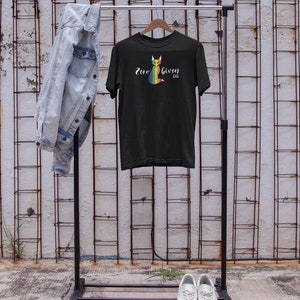 May include: Black t-shirt with a rainbow fox graphic and the text "Zero Given".