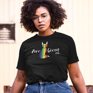 May include: Black t-shirt with a rainbow fox graphic and the text "Zero Giver" with an infinity symbol.