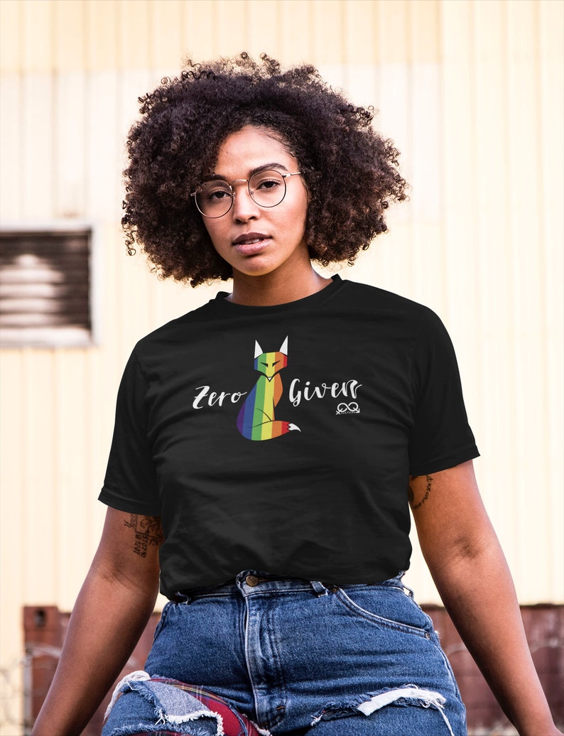 May include: Black t-shirt with a rainbow fox graphic and the text "Zero Giver" with an infinity symbol.