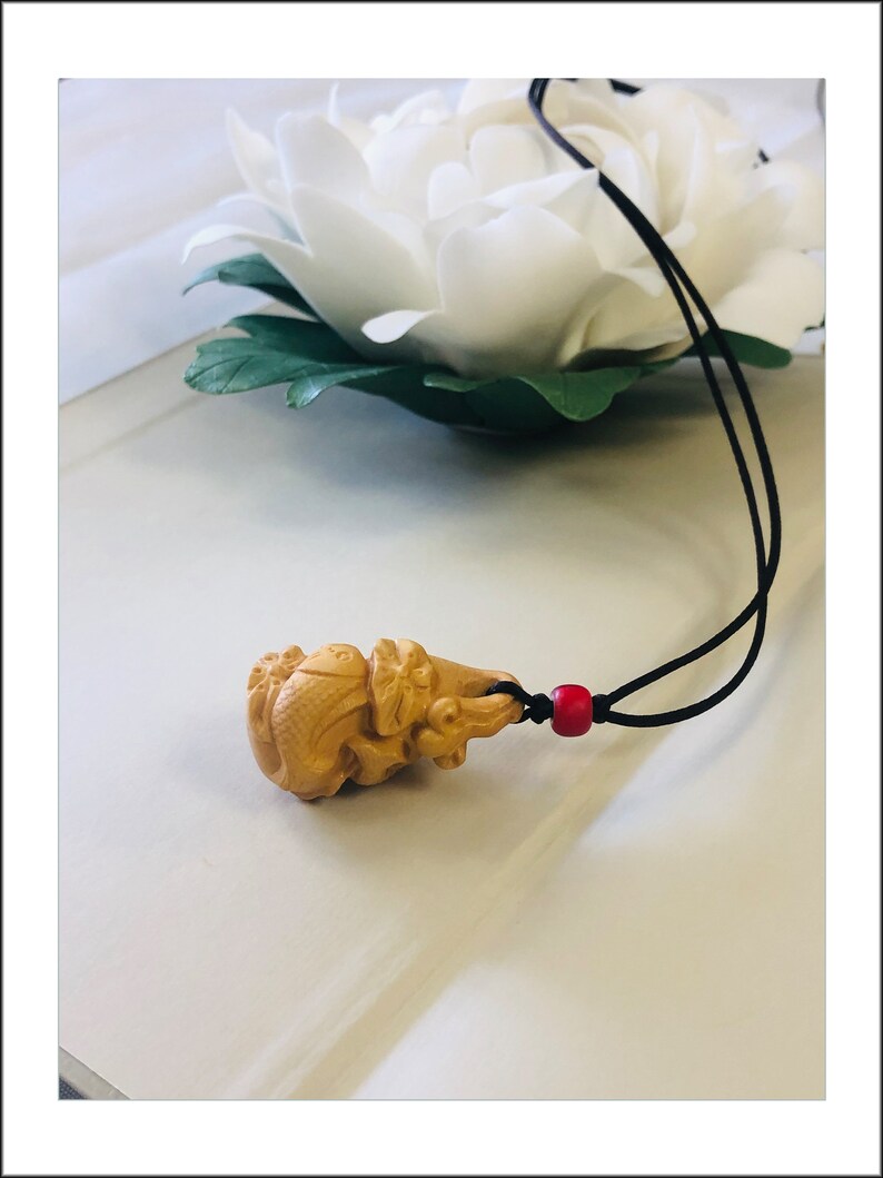 Boxwood Gourd Pendant Necklace features Cod Jump Over Dragon Gate