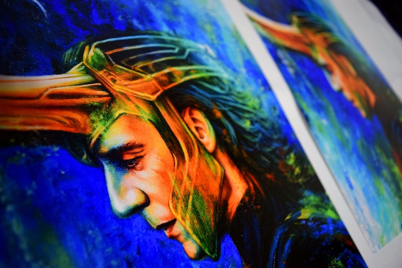May include: A colourful painting of a man with long dark hair wearing a gold helmet. The background is a blue and green nebula.