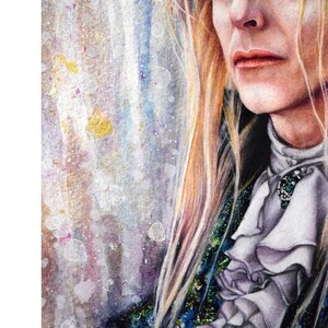 May include: A watercolor painting of a person with long blonde hair, wearing a dark green and blue patterned jacket with a white ruffled collar. The background is a light blue and white watercolor wash with gold and pink accents.