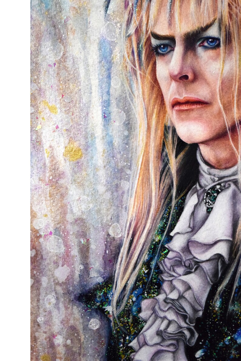 May include: A watercolor painting of a person with long blonde hair, wearing a dark green and blue patterned jacket with a white ruffled collar. The background is a light blue and white watercolor wash with gold and pink accents.
