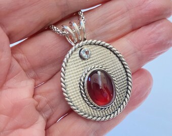 Spessartite Garnet Cabochon and Petite Faceted Cubic Zirconia are set in textured Sterling Silver With Twisted Wire