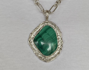 Beautiful Malachite Gemstone in a Textured Sterling Silver Setting with a Handmade Sterling Silver Chain. ONE OF A KIND