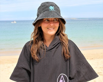 Get ready for the beach !  The EL YAQUE, our unisex Travel + Beach /Surf Poncho +swim robe - outdoor living at its best! The perfect Gift.