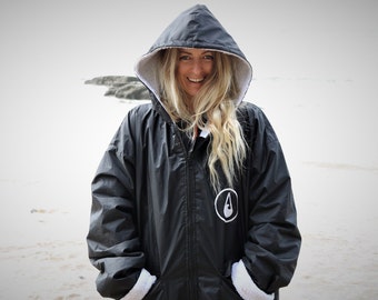 Ready for the outdoors!  JETY Sherpa poncho/changing swim robe - surf,SUP & wild swim. Super warm + waterproof. Perfect water lover's gift!