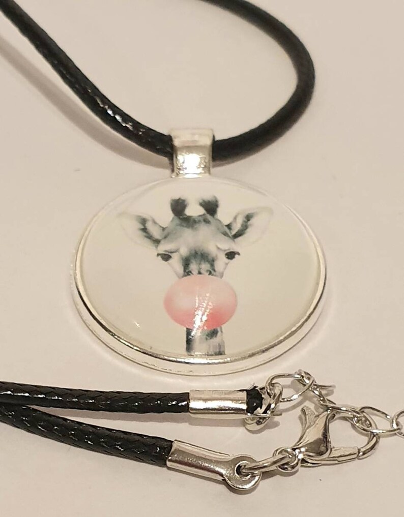 20mm cute giraffe cabachon bezel pendant necklace on an 18 inch black waxed chain.