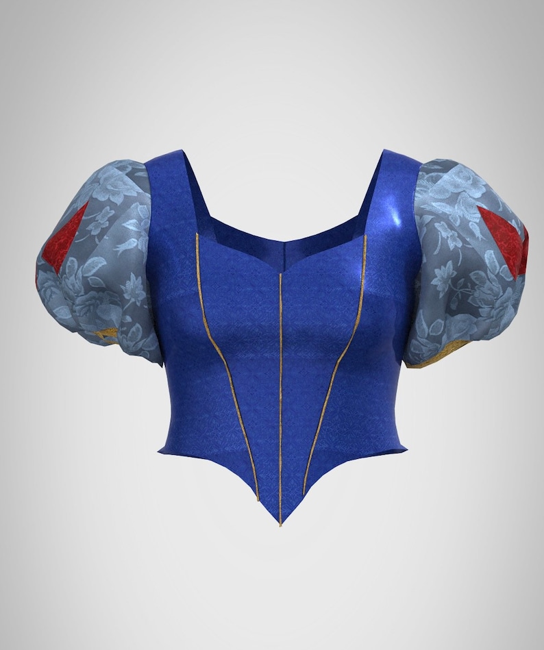 Puede incluir: Un corpi&ntilde;o azul con escote en punta y ribetes dorados. El corpi&ntilde;o tiene una forma ajustada y est&aacute; adornado con mangas de estampado floral.
