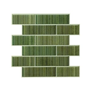 May include: Green rectangular tiles arranged in a brick pattern. Each tile has vertical lines, creating a textured appearance. The tiles vary in shades of green, from light to dark, against a white background.