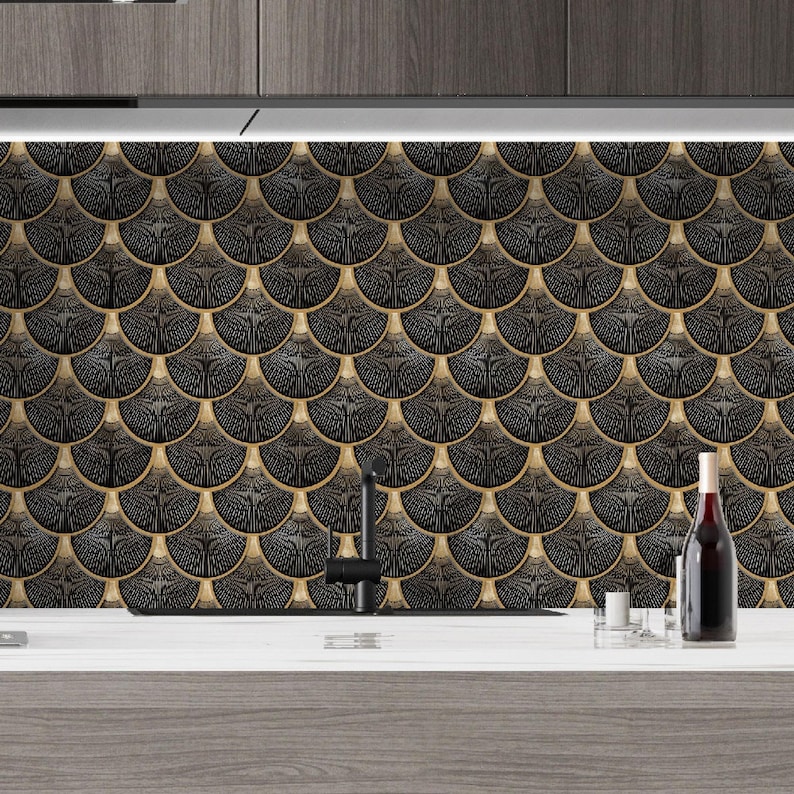 Black Egyptian peel-and-stick tile set in overlapping scallop shapes with tan borders for a 3D vinyl backsplash.