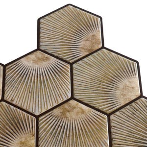 Light brown hexagon peel-and-stick tile sheet for kitchen backsplash; wood-look honeycomb pattern, self-adhesive vinyl tile.