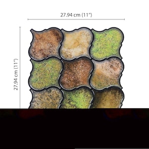 3D peel-and-stick wall tile grid with scalloped square tiles in moss green, brown, and tan for an earthy kitchen backsplash.
