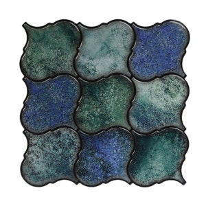 May include: A set of nine blue and green ceramic tiles with a decorative, scalloped edge. The tiles are arranged in a repeating pattern.