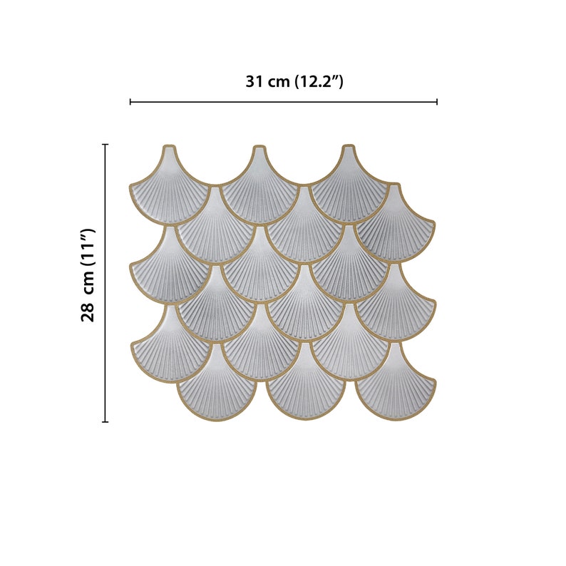 White 3D peel-and-stick tile with gold-edged scallop pattern, perfect kitchen backsplash and wall decor.