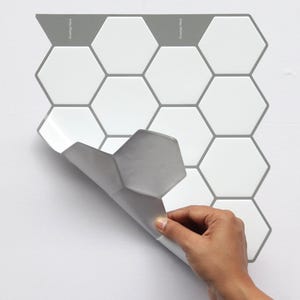 3D peel-and-stick hexagon tile sheet for kitchen backsplash; white/gray glossy tiles with self-adhesive backing
