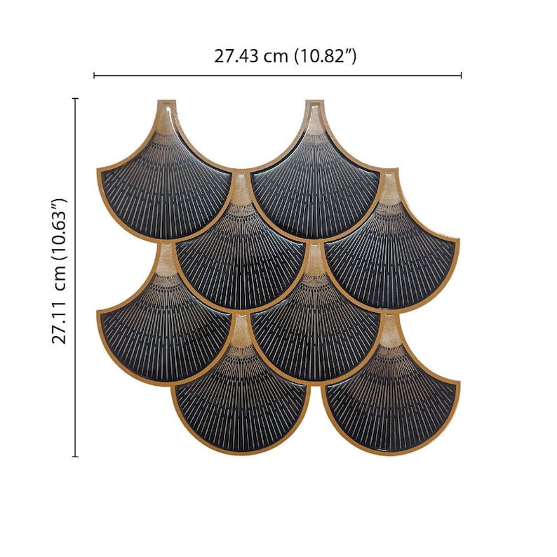 Black Egyptian peel-and-stick tile set in overlapping scallop shapes with tan borders for a 3D vinyl backsplash.