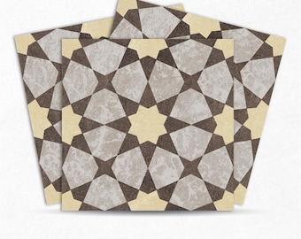 May include: Three beige and brown patterned ceramic tiles with a geometric design. The tiles have a distressed look and feature a repeating pattern of stars and octagons.