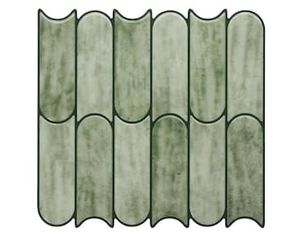 Könnte beinhalten: Dekorative grüne und graue Fliese mit einer einzigartigen Form. Die Fliese hat eine strukturierte Oberfläche mit einer dunkelgrünen Umrandung. Das Design zeigt ein sich wiederholendes Muster aus länglichen, gebogenen Formen und erzeugt eine ansprechende Oberfläche.