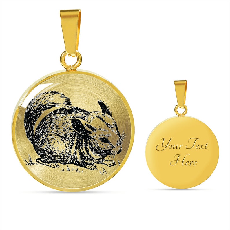 May include: Gold-tone pendant necklace featuring a detailed illustration of a chinchilla. The back of the pendant is blank and can be personalized with text.