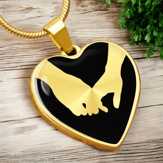 Grasping Hands Heart Necklace Canada