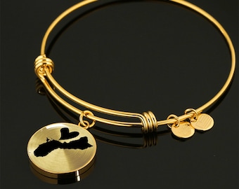 Guam armband: Kirurgiskt stål, guldfinish