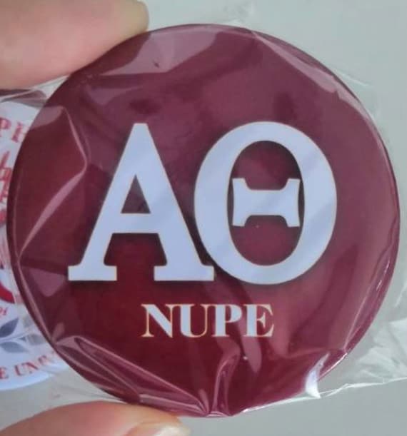 AT Nupe - Button