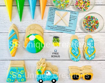 May include: A set of summer-themed cookie decorating kits. The kit includes a variety of cookie cutters, sprinkles, and icing. The cookie cutters include a surfboard, a beach ball, a pair of flip-flops, a pair of sunglasses, and a truck with surfboards in the back. The sprinkles are in three different colors: blue, green, and yellow. The icing is in four different colors: yellow, green, blue, and orange. The kit also includes a free bonus item, which is a small bag of sprinkles.