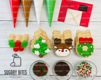 May include: A Christmas cookie decorating kit with four different cookie designs: a holly sprig, a Christmas tree, a reindeer, and a wreath. The kit includes icing bags, sprinkles, and instructions. The kit is from Sugary Bites Edible Art.