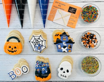 May include: A Halloween cookie decorating kit with six different cookie designs, including a pumpkin, spiderweb, haunted house, ghost, skull, and BOO. The kit includes four icing colors, sprinkles, and a decorating tool.