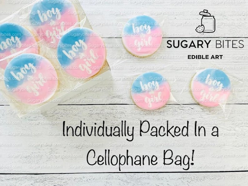May include: Six decorated sugar cookies with blue and pink icing. The cookies are individually wrapped in cellophane bags. The cookies are decorated with the words "boy & girl" in white icing. The cookies are arranged in a clear plastic container. The container is sitting on a wooden surface. The text "SUGARY BITES EDIBLE ART" is printed on a white background.