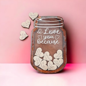 May include: A wooden mason jar sign with the text "I Love You Because" and a heart shape around the word "you". The jar is filled with small wooden hearts, each with a different reason why you are loved.