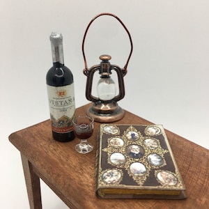 1:6 scale Set with antique dollhouse book, oil lamp and wine bottle with filled glass, miniature library accessories