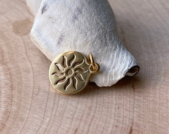 Sun pendant made of stainless steel, gold-colored